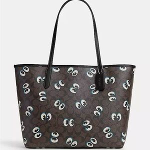 NWT never opened. Coach City Tote In Signature Canvas With Halloween Eyes